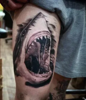 mens-thigh-tattoo-ideas-49