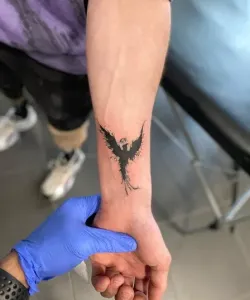 Phoenix-Tattoo-Design-Ideas-Meaningful-and-Inspiring-Designs-for-Every-Style-25