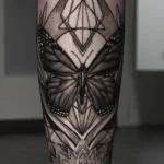 50 Animal Tattoo Ideas: The Complete Guide by Animal, Style and Placement 25 Ornamental blackwork butterfly tattoo with mandala dotwork covering a calf