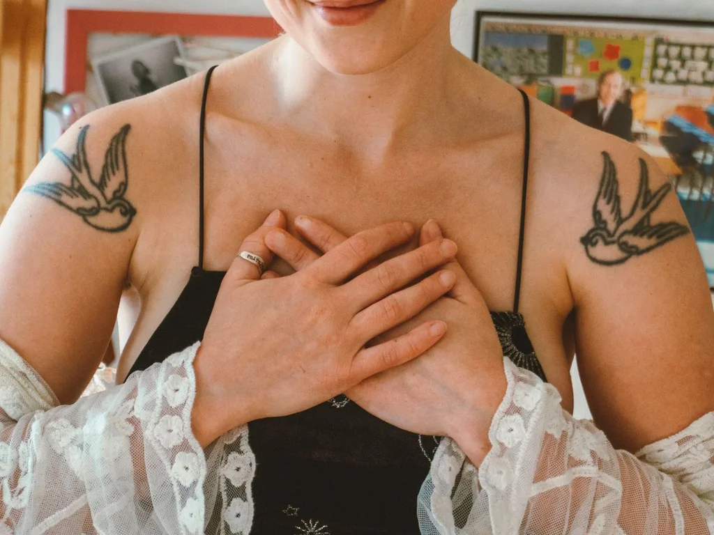 35 Bird Tattoo Ideas: Meanings, Species and Best Placements 24 Pair of swallow tattoos, one on each shoulder
