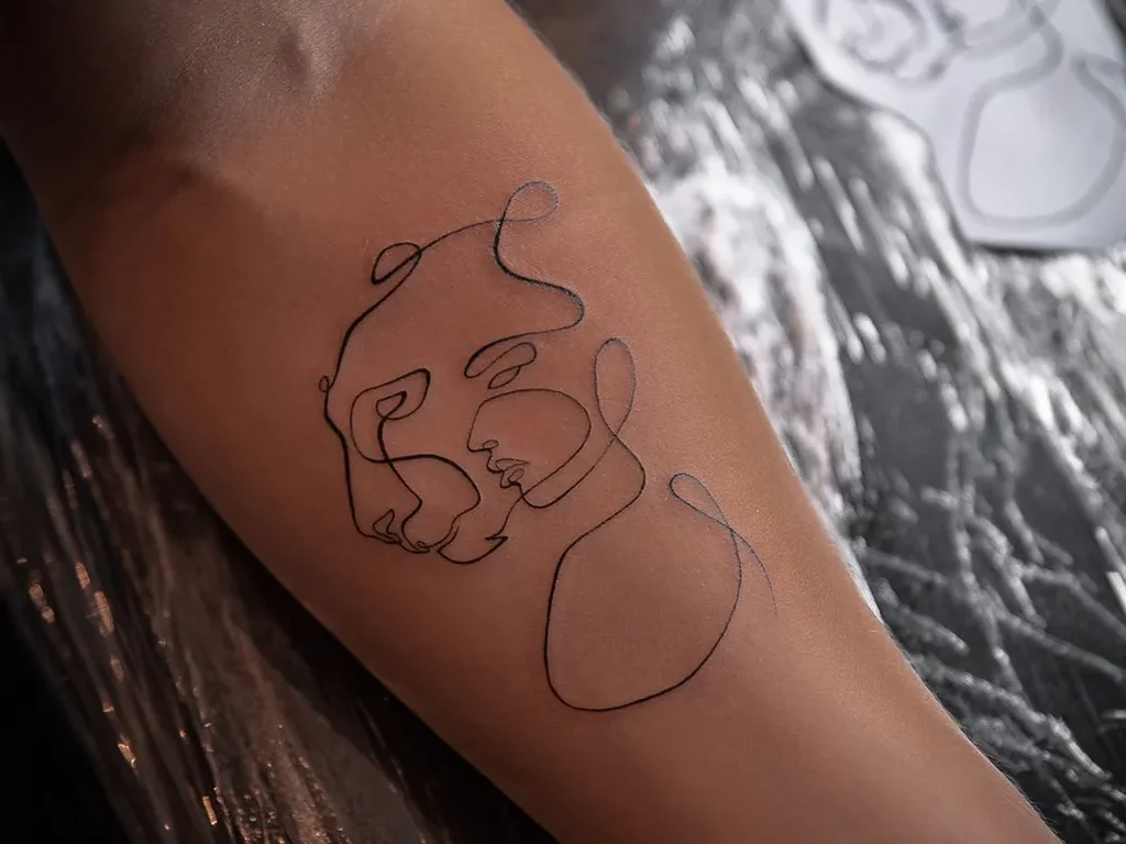 25 Fine Line Tattoo Ideas: Delicate Designs, Honestly Rated 13 One line dog tattoo drawn in a single continuous line on a forearm