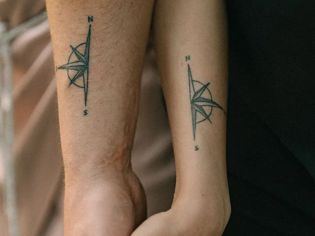 25 Fine Line Tattoo Ideas: Delicate Designs, Honestly Rated 24 Matching fine line compass tattoos on a couple's forearms