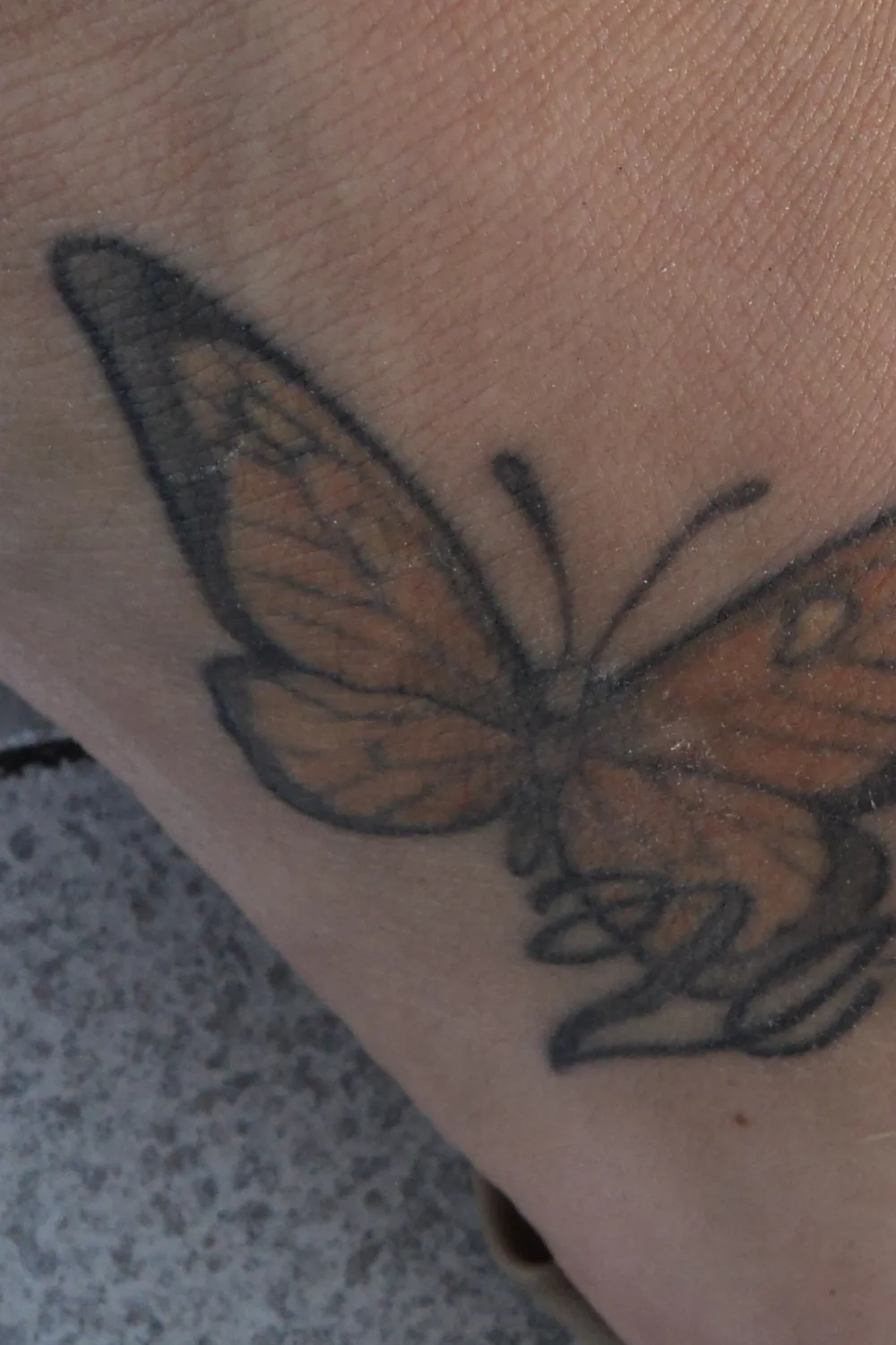 23 Small Tattoos for Women: Tiny Designs That Say a Lot, Quietly 9 Butterfly and flower tattoo on the top of the foot