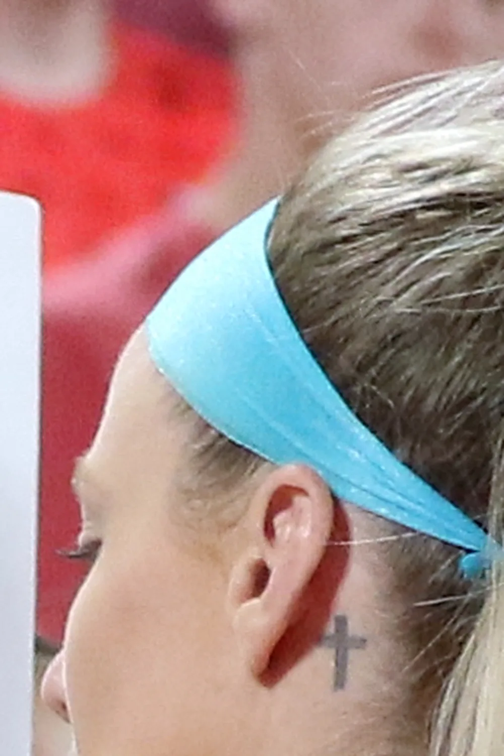 23 Small Tattoos for Women: Tiny Designs That Say a Lot, Quietly 16 Small cross tattoo tucked behind the ear