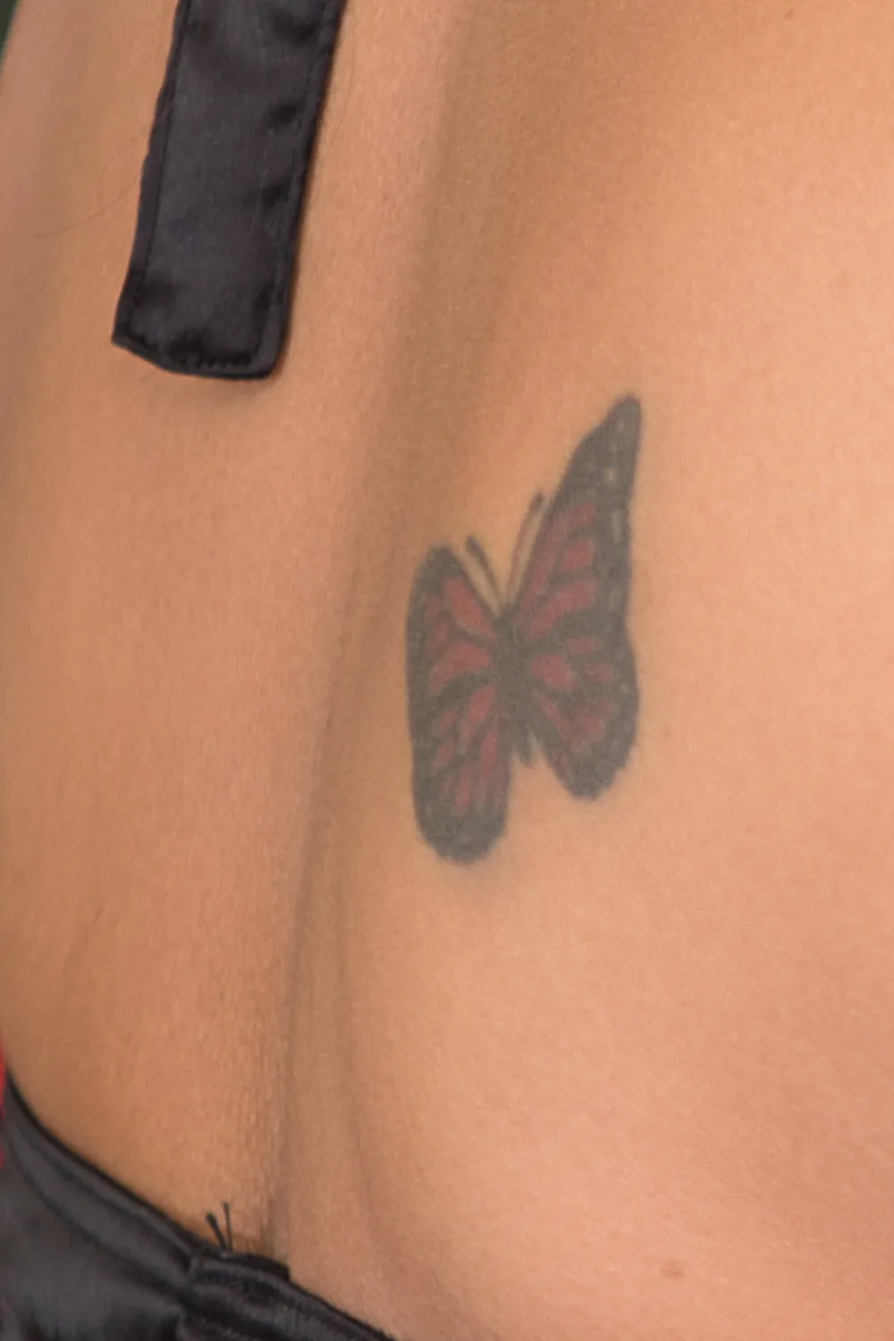 23 Small Tattoos for Women: Tiny Designs That Say a Lot, Quietly 24 Small butterfly tattoo on the upper back