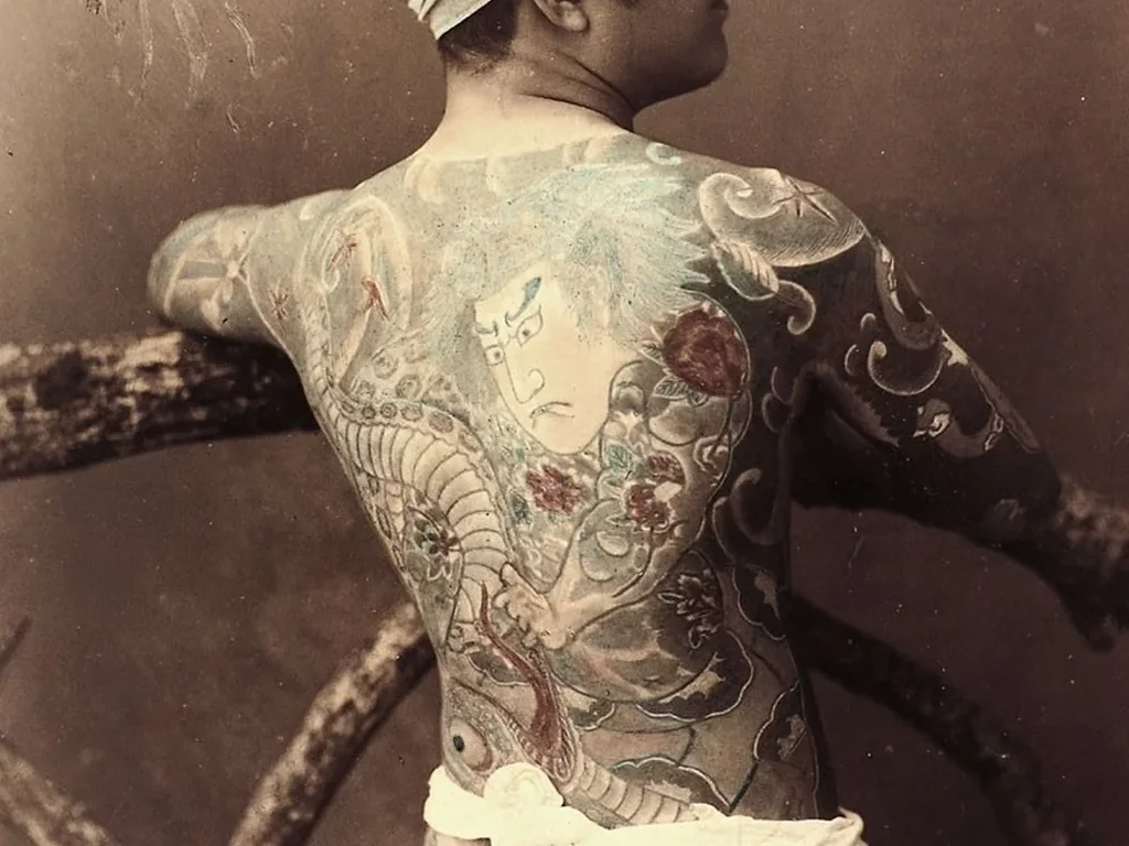 20 Snake Tattoo Ideas: Meanings, Styles and Placements That Work 5 Antique 1880s photograph of a Japanese full back tattoo with a large snake